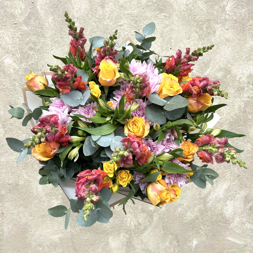 vibrant birthday flower arrangement with pink and yellow blooms delivered in Durban